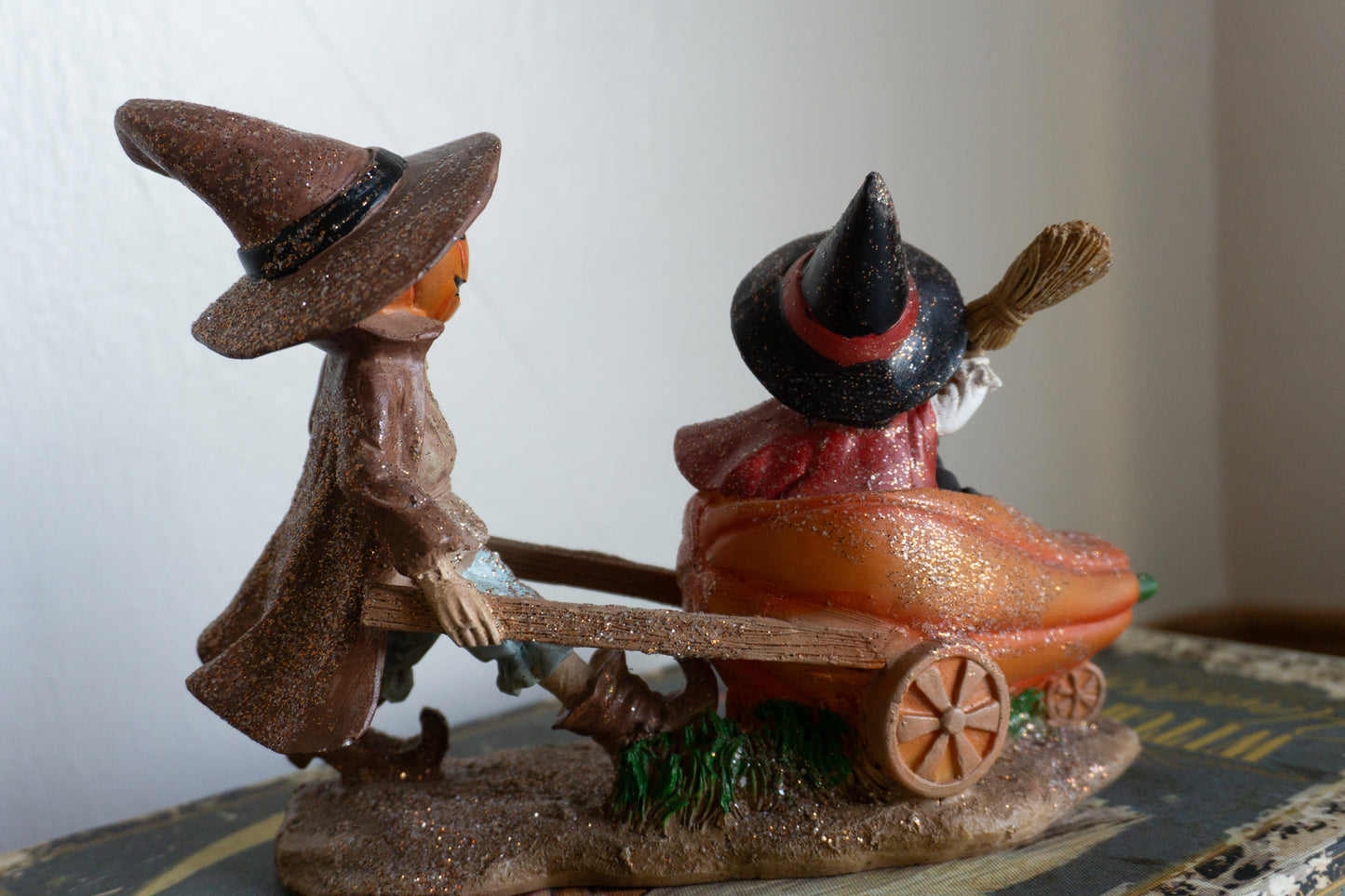 Scarecrow and Child in Wheelbarrow Figurine