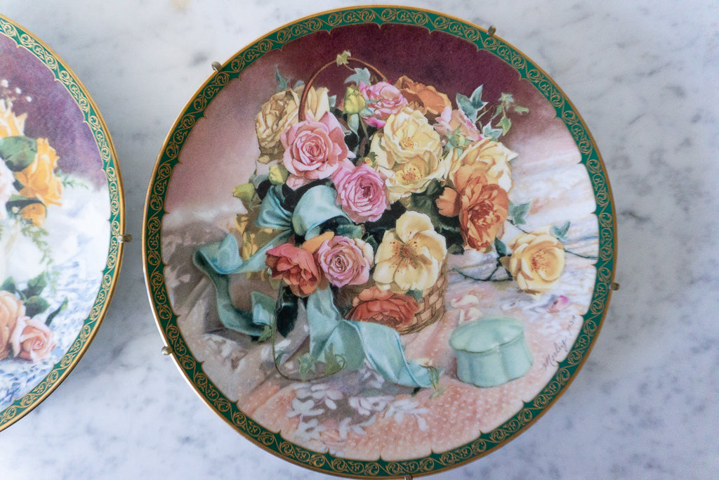 Close-up of "Country Charm" plate with a detailed floral design and green and gold trim