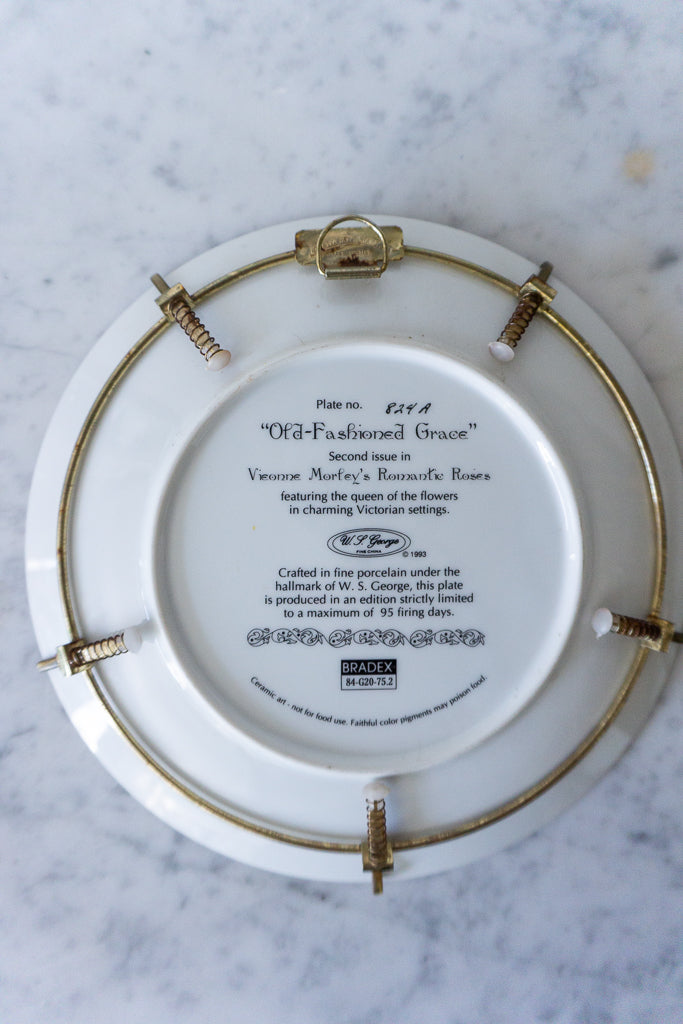 Back of "Old-Fashioned Grace" plate showing markings and plate hanger