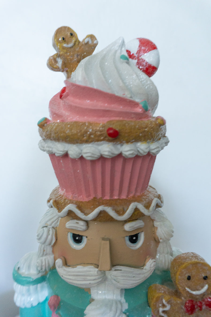 Cupcake Nutcracker Holding Gingerbread