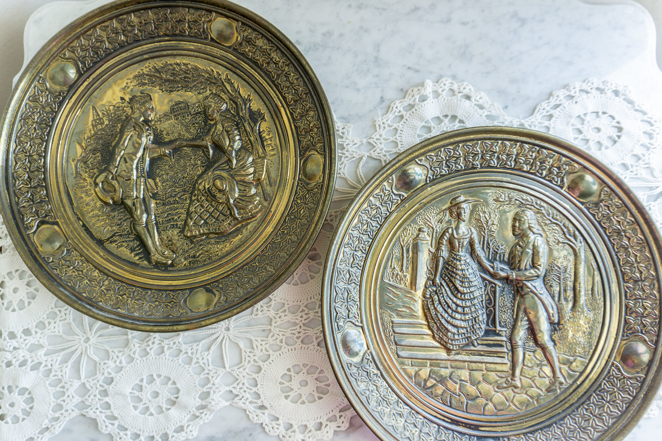 Pair of Embossed Brass Wall Plaques – Victorian Courting Scene Decorative Art