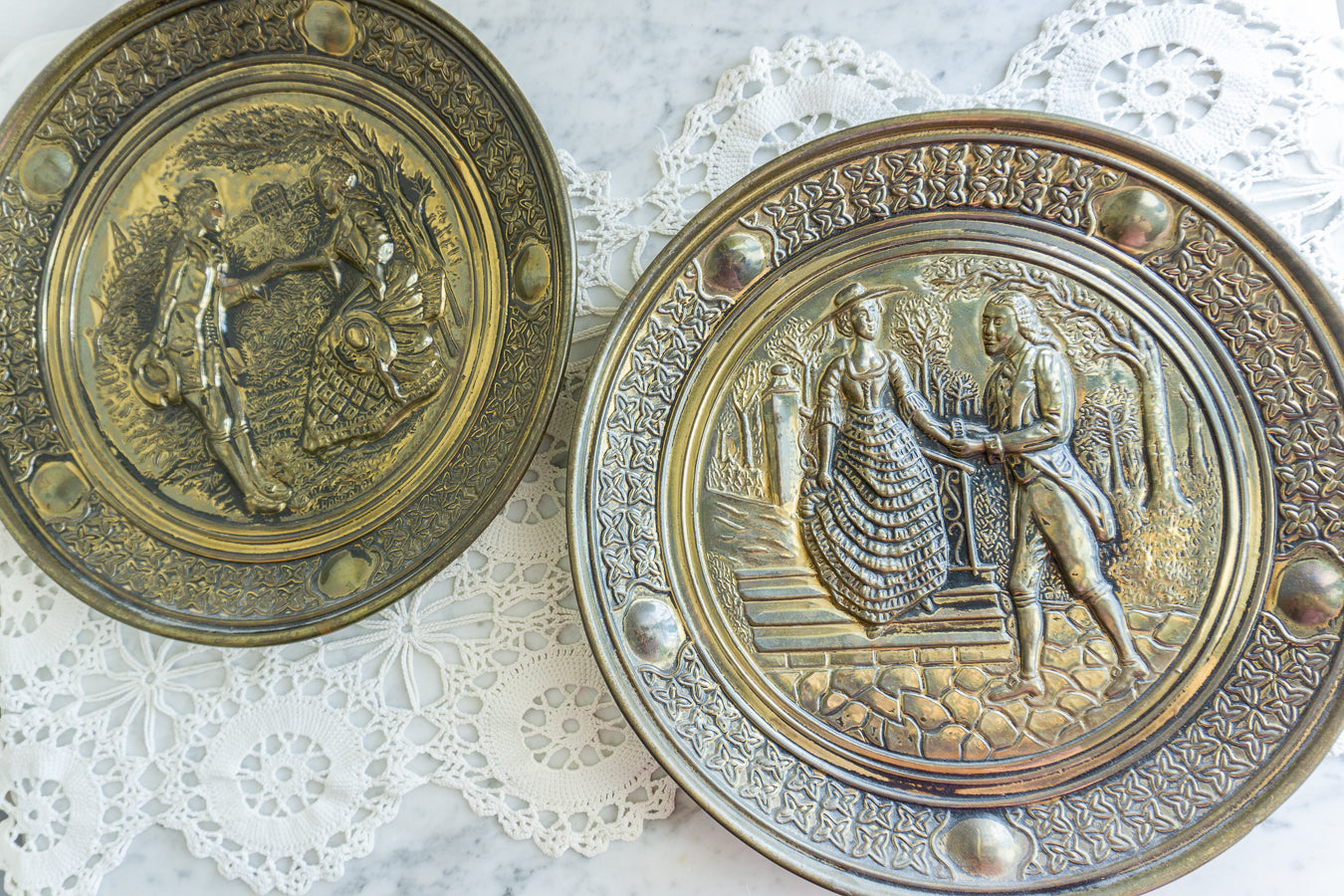 Pair of Embossed Brass Wall Plaques – Victorian Courting Scene Decorative Art