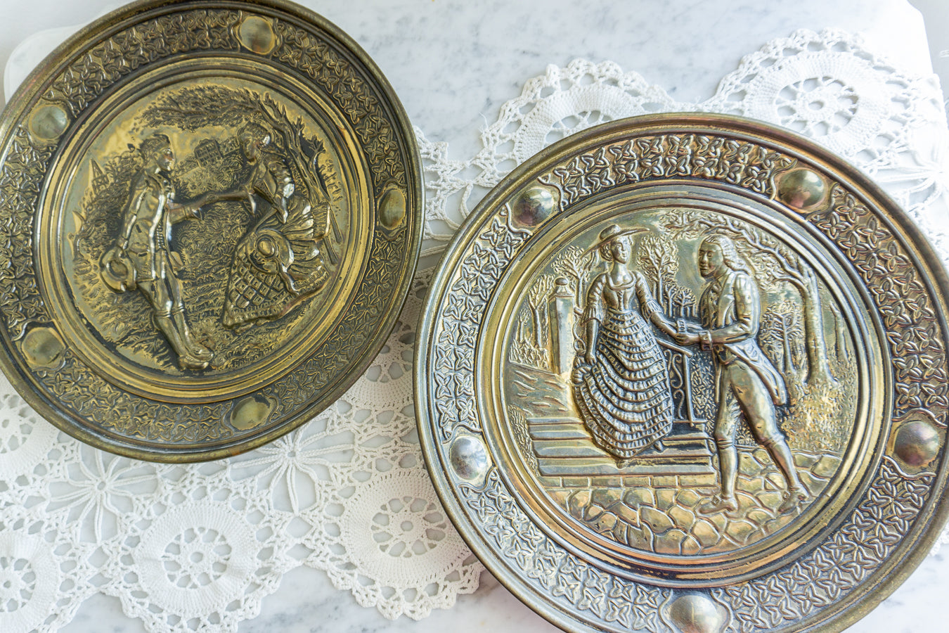 Pair of Embossed Brass Wall Plaques – Victorian Courting Scene Decorative Art