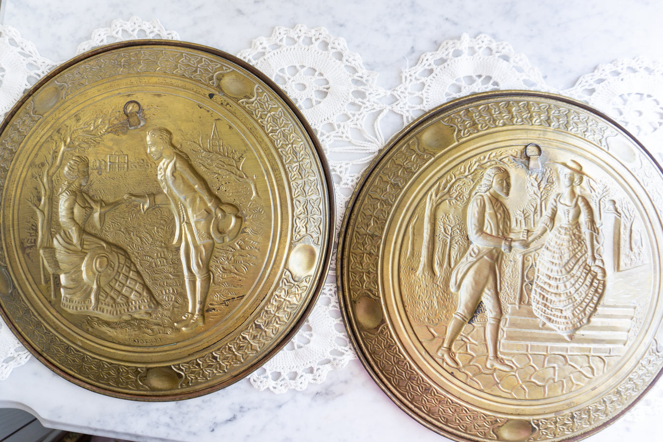 Pair of Embossed Brass Wall Plaques – Victorian Courting Scene Decorative Art