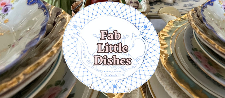 Beautifully curated vintage dishes collection featuring antique plates, serving ware, and glassware