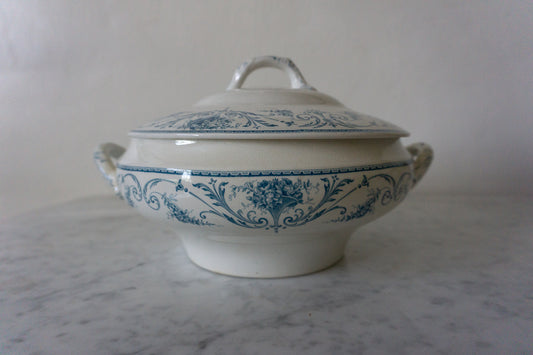 Close-up of the Louis XVI BFK blue and white covered tureen, showcasing the intricate blue floral and scroll pattern on the white porcelain base.