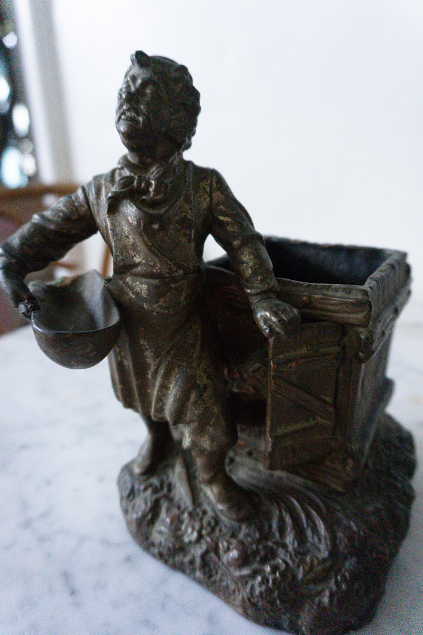 Antique Bronze Farmer Statue