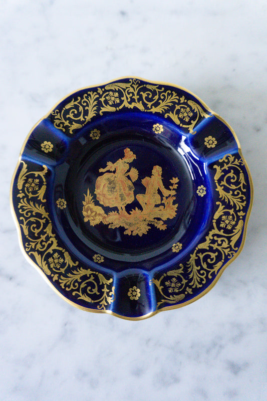 Top view of Limoges porcelain ashtray with cobalt blue and gold gilded design.