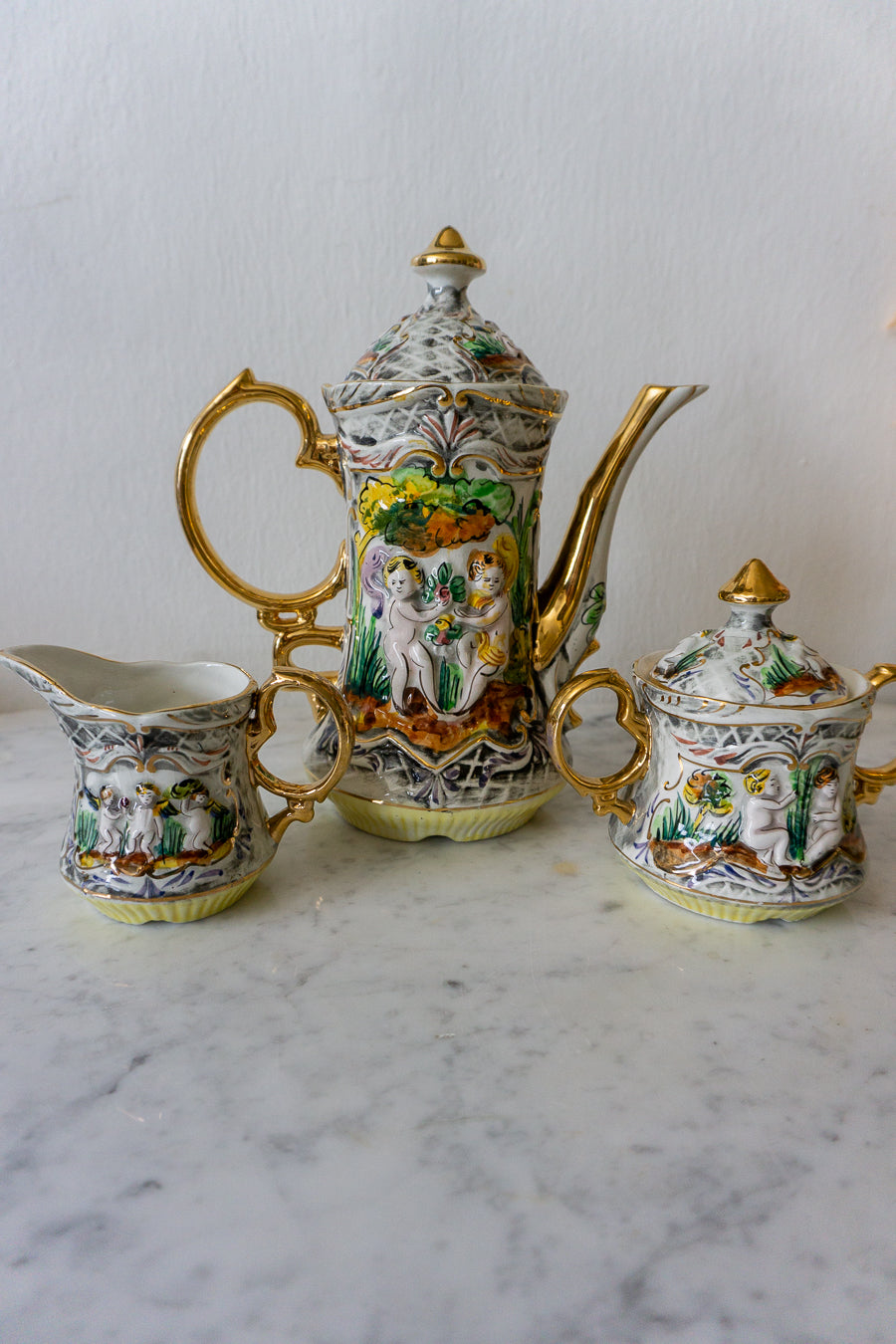 Vintage Pereiras Valado hand-painted porcelain tea set with gold gilded cherub designs