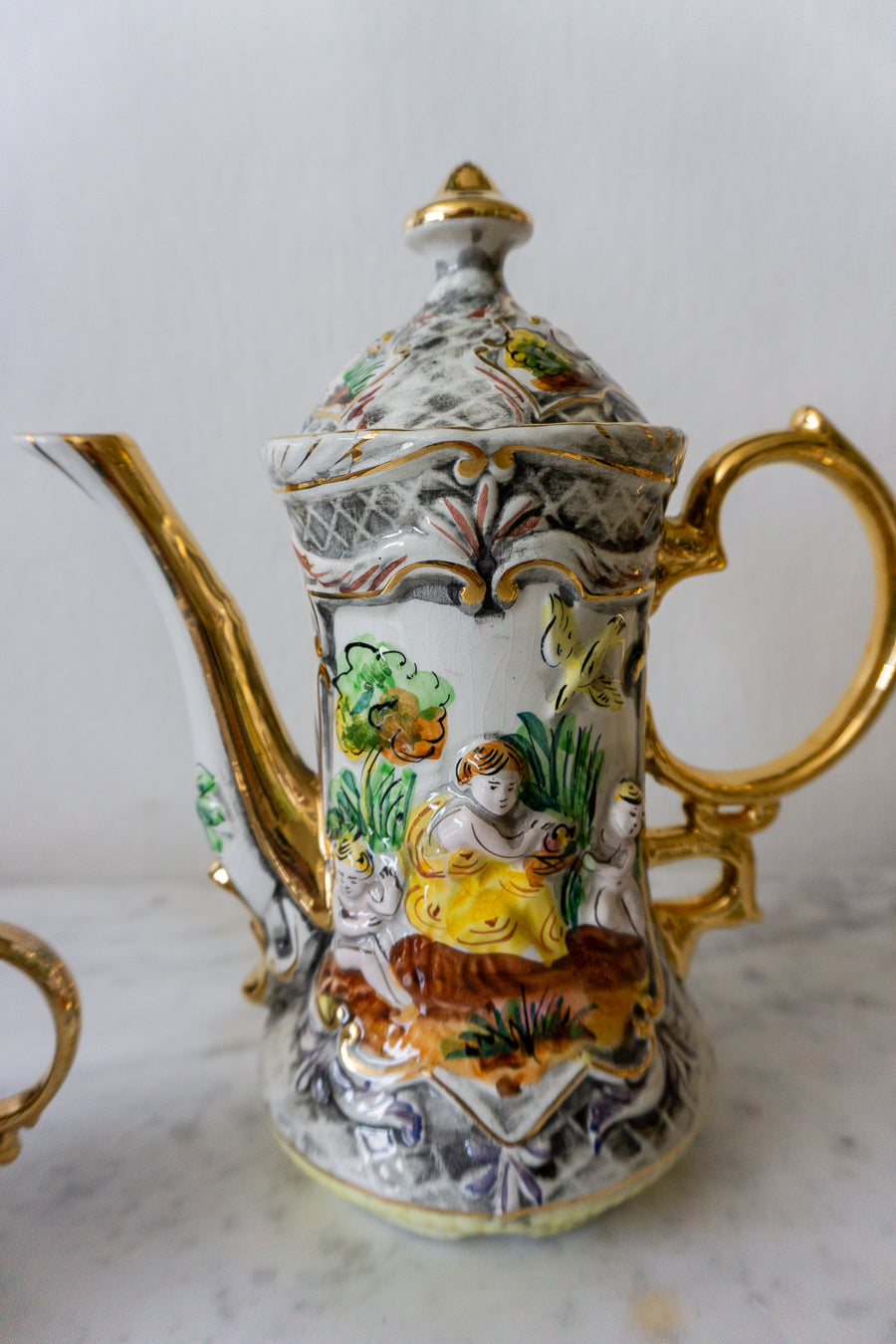 Exquisite detailing on vintage Pereiras Valado porcelain tea set with gold accents