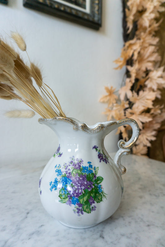 Close-up of Lefton China pitcher showcasing floral design.