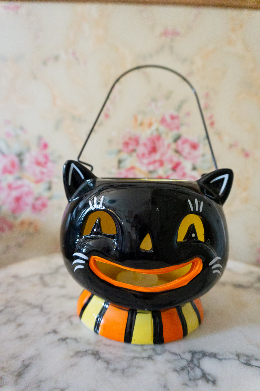 Johanna Parker Halloween Cat Lantern featuring a vintage-style black cat with orange and yellow accents.