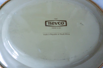 Back view of the Nevco Floral Oval Platter showing the Nevco brand mark and 'Made in Republic of South Africa' inscription.