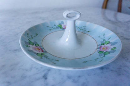 Side view of the vintage hand-painted Japanese porcelain lemon slice server, showcasing its elegant floral design.