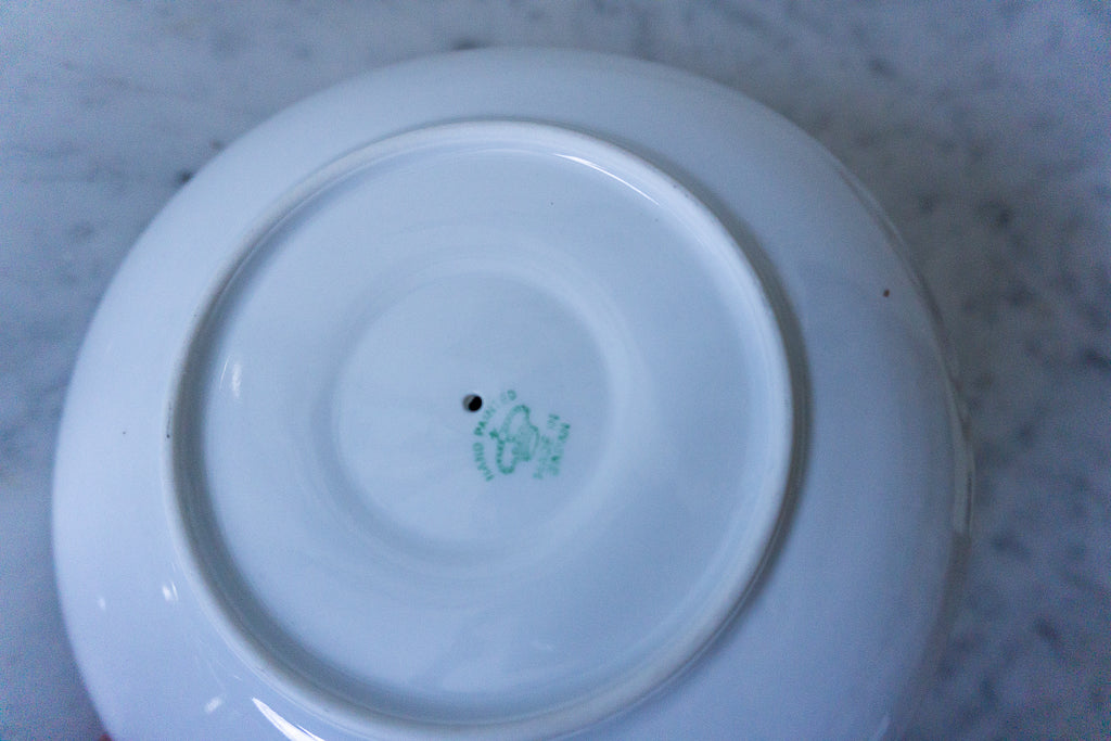 Bottom view of the vintage hand-painted porcelain lemon slice server, displaying the maker's mark.