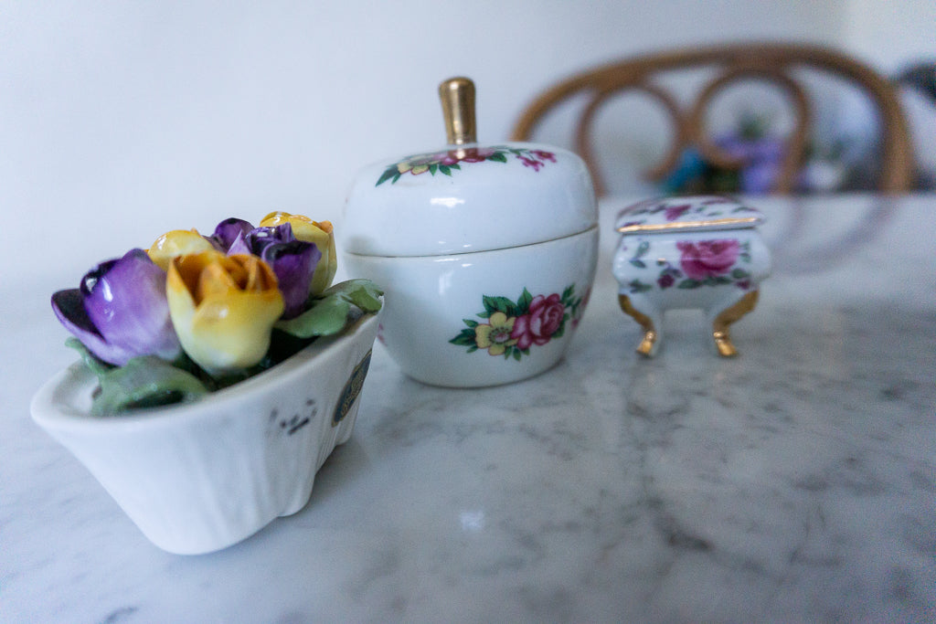 Close-up of apple-shaped trinket box.