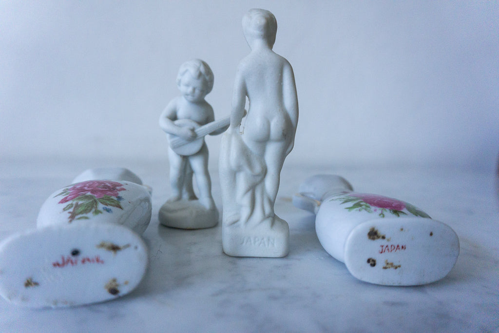 Bottom view showing 'Japan' markings on porcelain miniatures