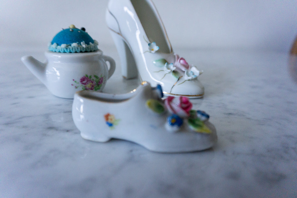 Detailed view of porcelain high-heeled shoe