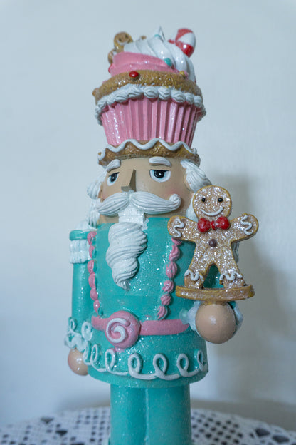 Cupcake Nutcracker Holding Gingerbread