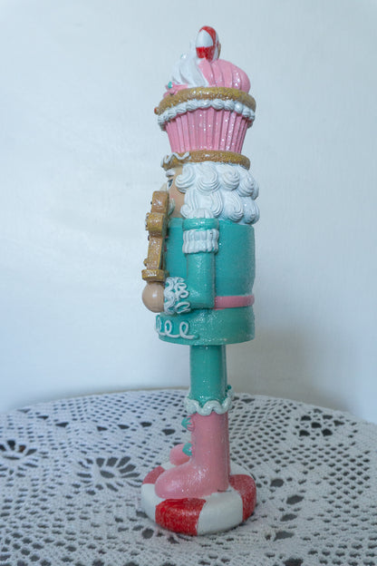 Cupcake Nutcracker Holding Gingerbread