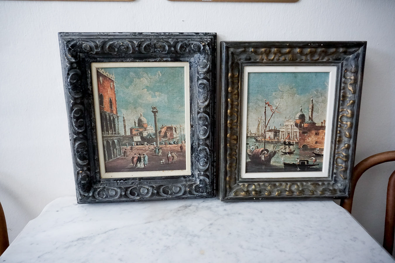 Pair of antique Italian Venetian lithographs in ornate frames, depicting picturesque scenes of Venice.