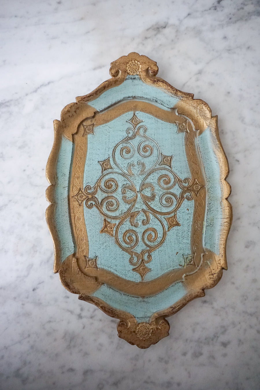 Side view showcasing the intricate scrollwork on the Italian Florentine tray.