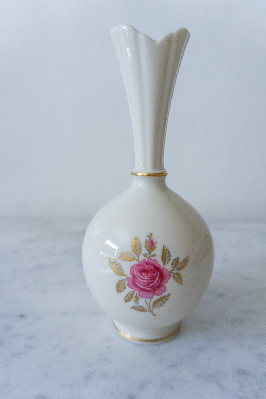 Vase with a single dried flower - illustrating its decorative use in a minimalist setting.